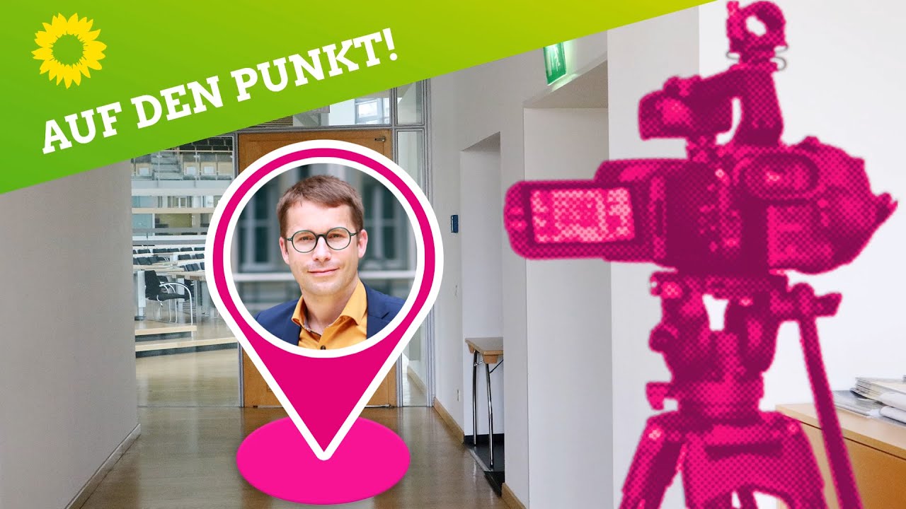 KI generiert: Das Bild zeigt eine stilisierte Kameradarstellung neben einer Standortmarkierung mit einem Porträtfoto einer Person, begleitet vom Text "Auf den Punkt!" in einer grünen Sprechblase. Die Szene spielt sich in einem Büro- oder Flurgang ab.